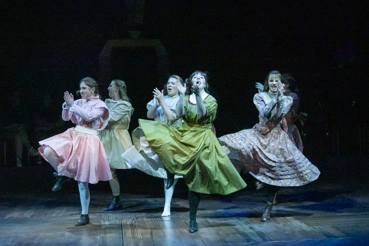 2022 Spring Awakening Promotional Photo 6 Girls in traditional dresses dancing and clapping